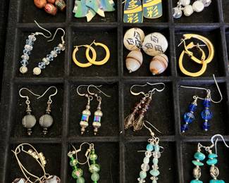 Hundreds of pieces of vintage costume jewelry, many signed.