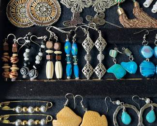 Hundreds of pieces of vintage costume jewelry, many signed.
