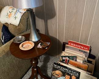 Vintage end/accent table; lots of vintage magazines/ephemera and decor.