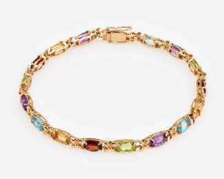 Lot 227: 10k Multi Color Gemstone Bracelet
