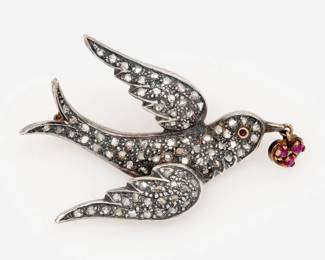 Lot 168: 18kt & Silver Swallow Bird Brooch with Diamonds And Rubies