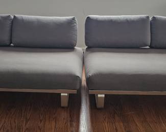 Indoor/Outdoor Italian made couches. Heavy metal base, with thick matteress. Removal backs for sleeping. Slip Covers can be removed.