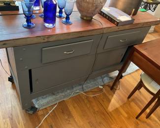 Butcher block island with storage and on wheels 38.5” x 69.5” x 25” $880 + tax