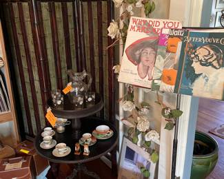 Bamboo screen, vintage sheet music, stand