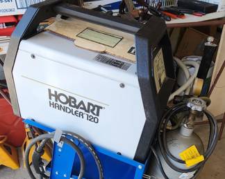 Hobart Handler 120 weilder with roll around cart one tank