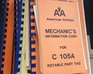 Stacks of American airlines Mechanics manuals