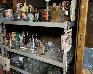 Liquor decanters, Coca Cola collectibles are soda bottles