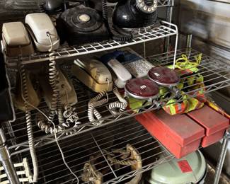 Collection of vintage phones and Sears pressure cooker