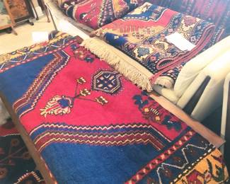 Turkish rugs and runners, bought in a turkey of the camel..lol... Large sizes, bright colors, and all unique
