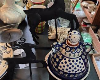 Candle holders and glass wear.