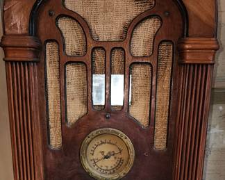 Vintage Atwater Kent 206 Cathedral Table Top Radio, a wooden radio with a classic cathedral-style arch top. The Model 206 is one of their more sought-after models, often found in collections and antique stores. It is a six-tube model with both broadcast and shortwave capabilities. The radio also features dual tuning controls for macro and fine-tuning.