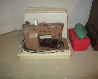 vintage SINGER sewing machine with button maker and box of attachments