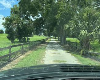 DRIVEWAY APPROACHING HOUSE
