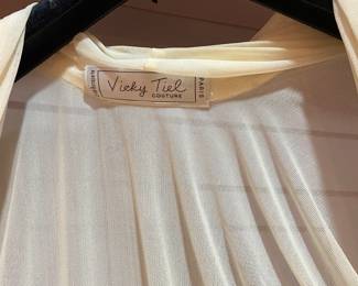 Several Vicky Tiel gowns