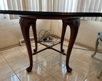 Glass topped round table....