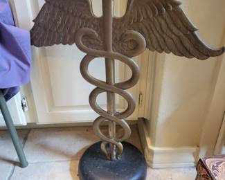 Cadaceus brass store display