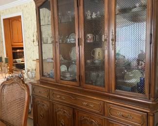 Beautiful ornate china hutch filled with glassware - matching server also available.