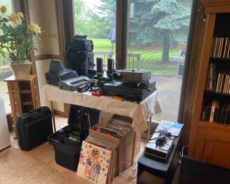 Lots of electronics.....Bose iPod system speaker dock, Kenwood and Pioneer equipment, Laser disk player with large supply of movies, Bose surround sound with six speakers, slide projector and more.