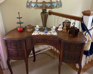Vintage kidney shape vanity desk, Tiffany style lamp.