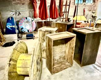 Cable spool, wooden boxes water and king rafts, golf clubs with bag,leather top end table iron plant stands, two Ethan Allen sofas andirons, fire place tools , and more.