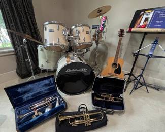 Drum set complete w/ cowbell, Guitars, Trumpets, Flute