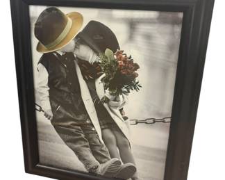 Two Children Kissing In Vintage Clothing