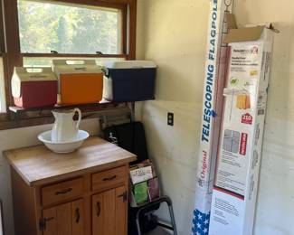 Butcher block floating stand, never used Pilates machine with all the accessories and paperwork, igloo coolers, pitcher and basin, telescoping flagpole  and parallel dryer.