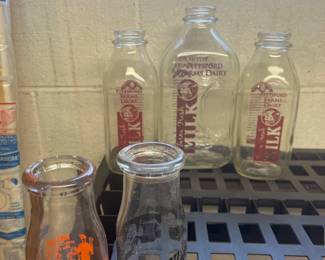 Sunset Farm Dairy from Newark, NY and The Malone Dairy from Malone, NY vintage milk bottles.