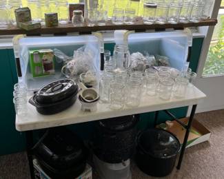 Large selection of canning jars, lids, rubber, and canning jar pans.