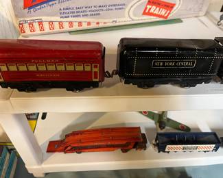 Antique metal train cars.