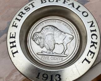 Pewter first Buffalo nickel.