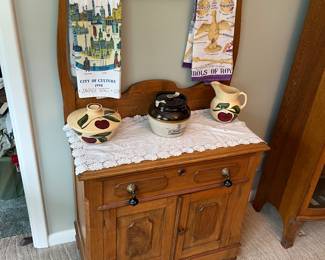 Antique wash stand with original towel bar, vintage towels, #3 three bean pot and vintage ceramics.