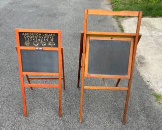 Antique wooden children’s chalkboards.