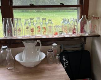 Water pitcher and basin, Butcher block table top and vintage milk bottles from Marion, Palmyra, Williamson, and finger Lakes dairies.
