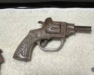 Antique Bat cap gun.