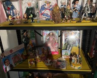 Large collection of Barbie dolls and accessories.