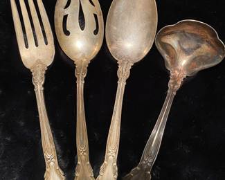 Large sterling serving pieces.
