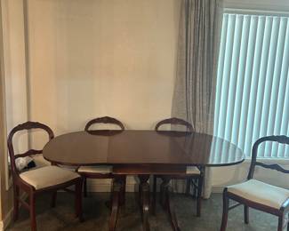 Antique 3 pedestal dining room set