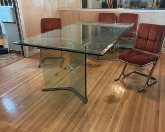 MCM modernist glass dining table with cantilevered chairs