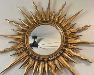 Gold sun mirror $90