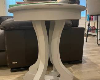 Small round grey table $50 each . Two for sale