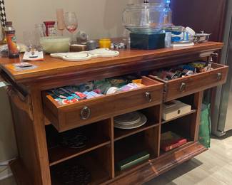 Rolling wood kitchen island . open on two sides $500
