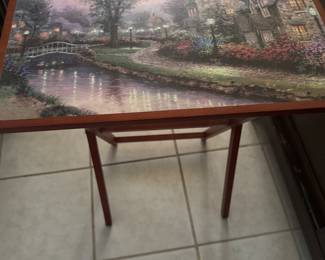Multiple TV stands with beautiful paintings