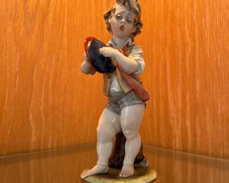 Lefton Figurine: Boy Playing Symbols