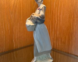 Lladro Porcelain Figurine Collection: Girl with Cockerel designed by Fulgencio Garcia and issued 1969 - 1993.