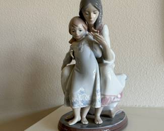 Lladro Porcelain Figurine Collection: Tenderness designed by Juan Huerta and issued 1987 - 2004.