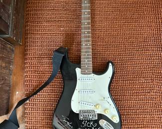 Signed guitar from sick puppies