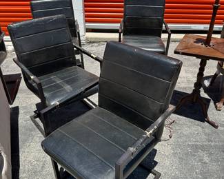 MCM black leather chairs