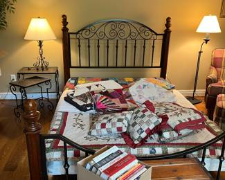 Queen size bed, quilts, antique trunk, nesting tables, nice lamps