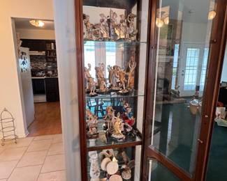 Several curio cabinets filled with goodies